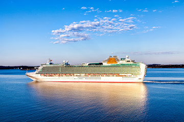 The cruise white liner floating on the water