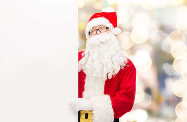 man in costume of santa claus with billboard