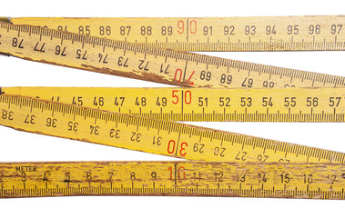 Folding ruler on white background