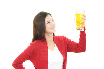 ビールを飲む女性 © Liza5450