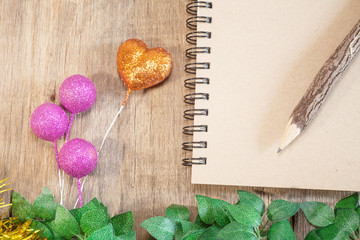 Blank textbook and pencil