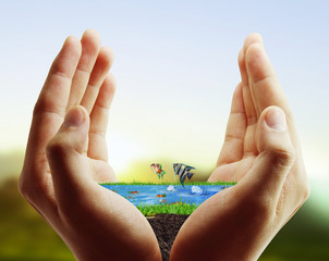 Human hand holding sea