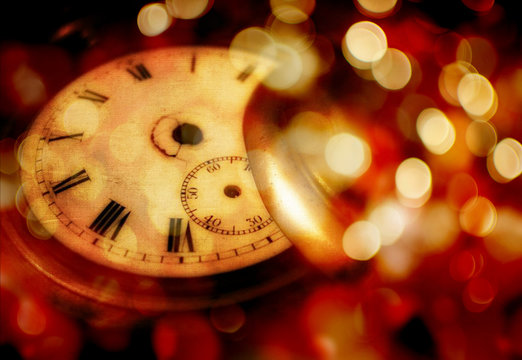 New year gold clock on abstract christmas background