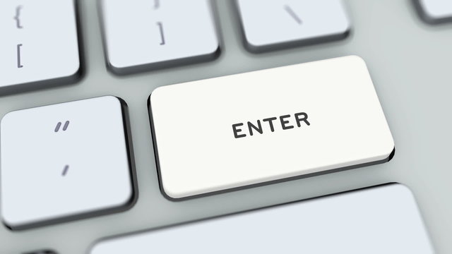 Enter button on computer keyboard. Key is pressed