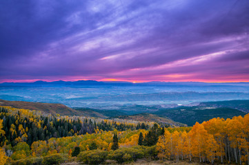 Fototapeta na wymiar Colorful Dramatic Sunset Sky over the City of Moab Fall Colors
