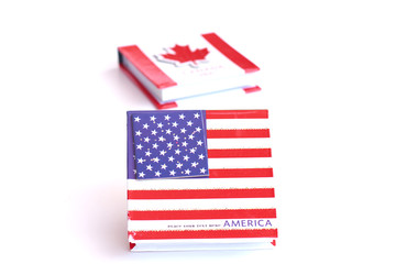 USA,Canadian flag on the notebook  - Stock Image