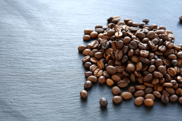 Heap of coffee beans on the slate