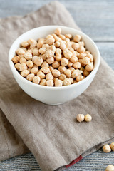 Raw chickpeas in a white bowl