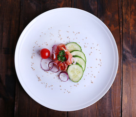 Fresh fish salad with vegetables