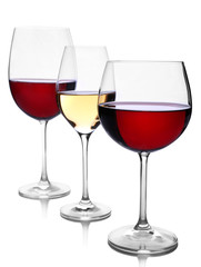 Wineglasses with red and white wine isolated on white
