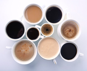 Obraz na płótnie Canvas Lots of coffee cups on white background