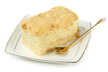 Napoleon cake on plate isolated on white