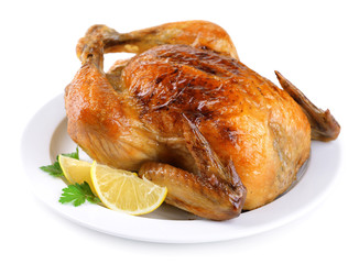 Delicious baked chicken on plate isolated on white