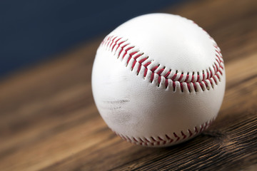 Baseball ball on wooden table