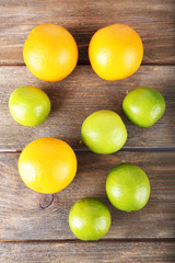 Ripe citrus on wooden background