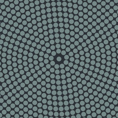 Circular halftone of gray circles on a gray background