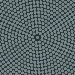 Circular halftone of gray circles on a gray background
