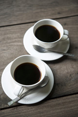 Two cups of black coffee