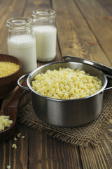 Millet porridge  in a metal pan