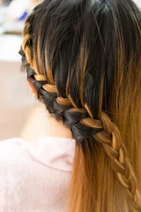 Poster long braid creative brown hair style in salon beauty