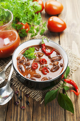 Chili soup with red beans and greens