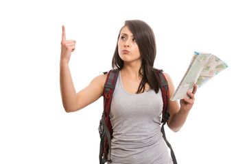 Obraz premium Young female tourist with map