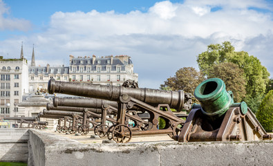 Fototapeta na wymiar Old cannons - Place des Les Invalides, Paris, France
