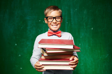 Pupil with textbooks