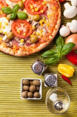 Delicious fresh pizza served on wooden table