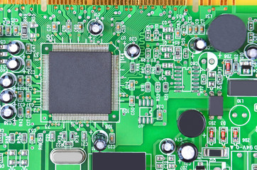 Printed computer motherboard with microcircuit, close up