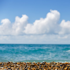 Fototapeta na wymiar Bright picture of seashore with blue sky and sea