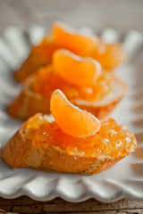 pieces of baguette with orange marmalade