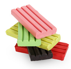 Children bright multicoloured plasticine in the column