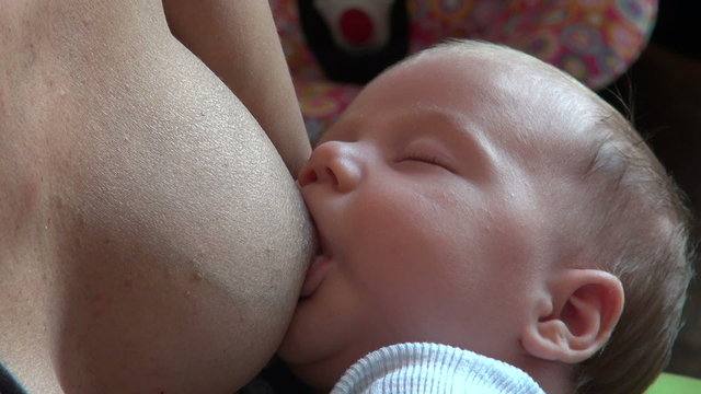 baby nursing close eyes