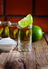 gold tequila with salt and lime