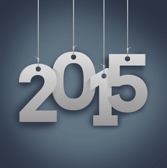 2015 hanging on blue background