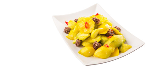 Pickled young mango with dried tamarind and chili slices