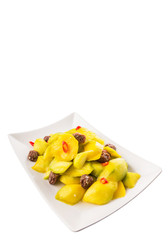 Pickled young mango with dried tamarind and chili slices