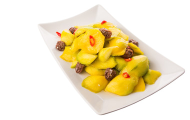 Pickled young mango with dried tamarind and chili slices