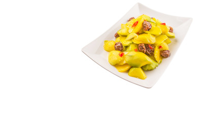 Pickled young mango with dried tamarind and chili slices