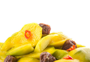 pickled young mango with dried tamarind and chili slices