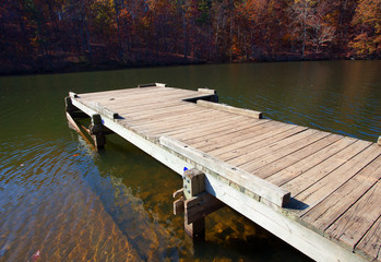 Boat dock in the fall and in North Carolina that is made from wood