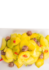 pickled young mango with dried tamarind and chili slices