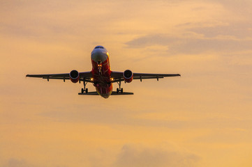 Airplane in the air over Phuket International Airport