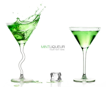 Martini Glasses with Splashing Green Cocktails. Template design