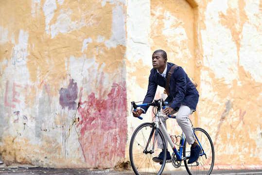 riding bike black man