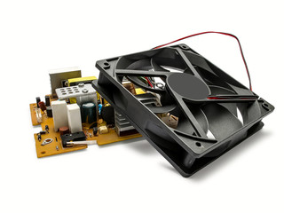 Computer cooler fan and power supply unit.