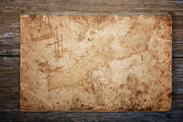 texture of an old writing-book on an old board