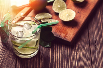 glass of water with ice and lime