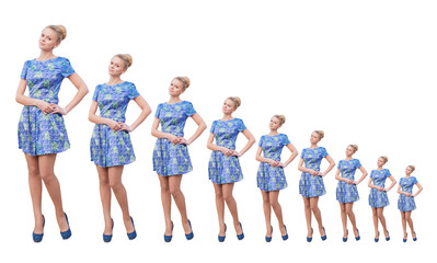 Fototapeta premium Young girls blonde in blue short dress